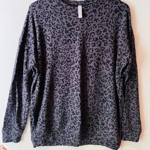 Athleta black and gray leopard print sweatshirt. Medium like new.